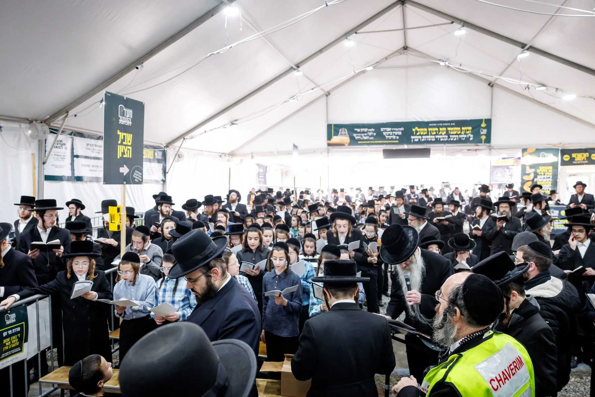 The tent at the tziyun on the yahrzeit, filled with mispallelim